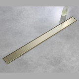 Caniveau de douche encastré or brossé