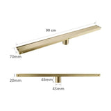 Caniveau de douche encastré or brossé