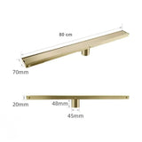 Caniveau de douche encastré or brossé