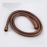 Flexible de douche or rose brossé