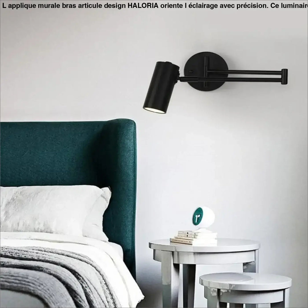 Applique murale bras articule noire avec tête cylindrique et base circulaire design HALORIA pour lecture