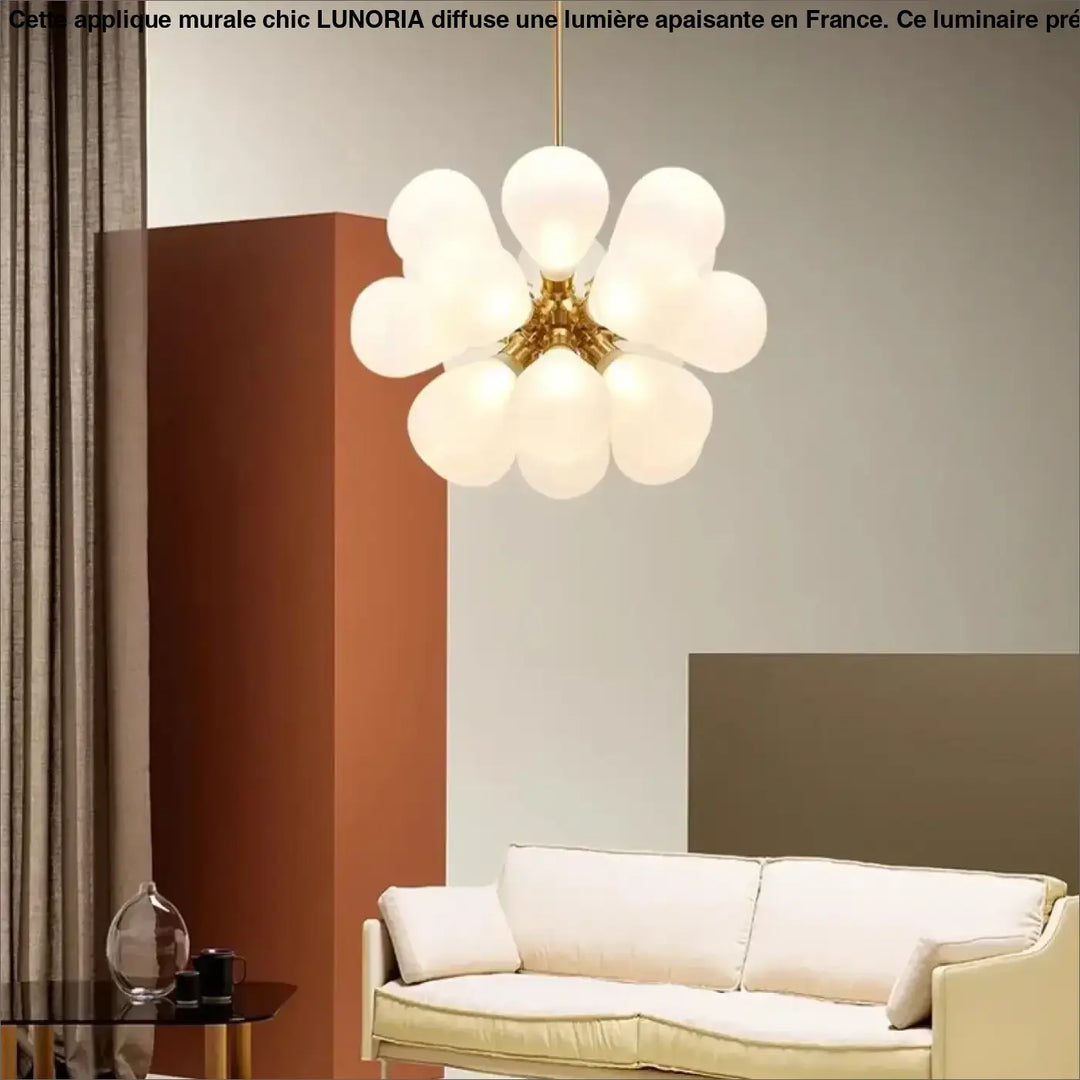 Suspension luminaire anthya avec cadre doré central et globes en verre soufflé effet floral moderne