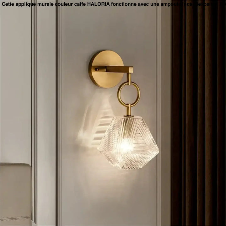 Applique murale dorée suspendu avec une petite chaine

