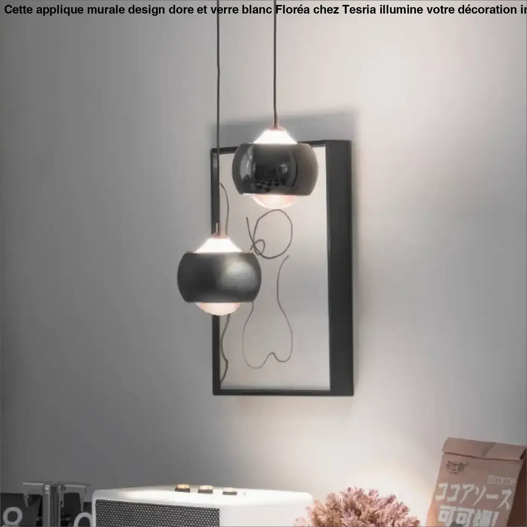 Suspension luminaire moderne boule métal noir et doré chic
