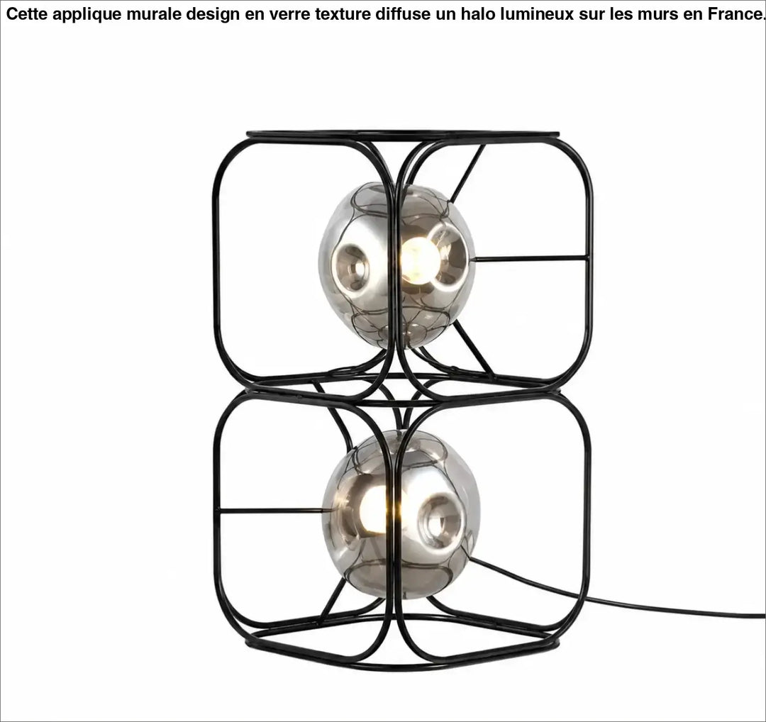 Lampe de table haloza avec cadre en métal noir et deux sphères lumineuses en verre miroir pour un table design sculptural