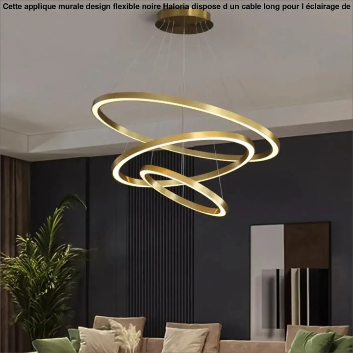Applique murale design en or avec trois anneaux entrelacés spiralés et câble long par haloria
