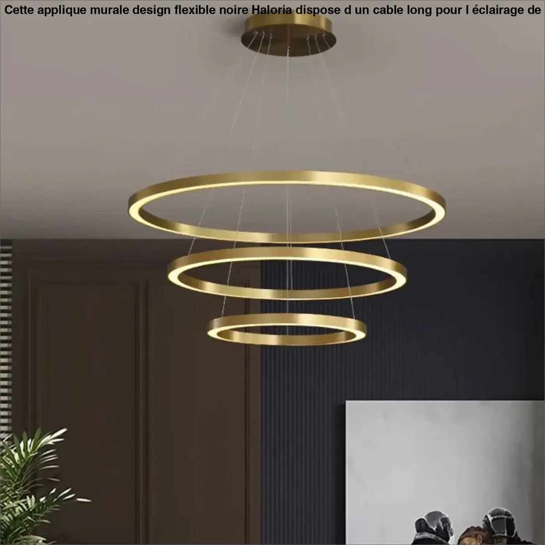 Applique murale design flexible noire haloria avec suspension led dorée à trois anneaux concentriques en métal