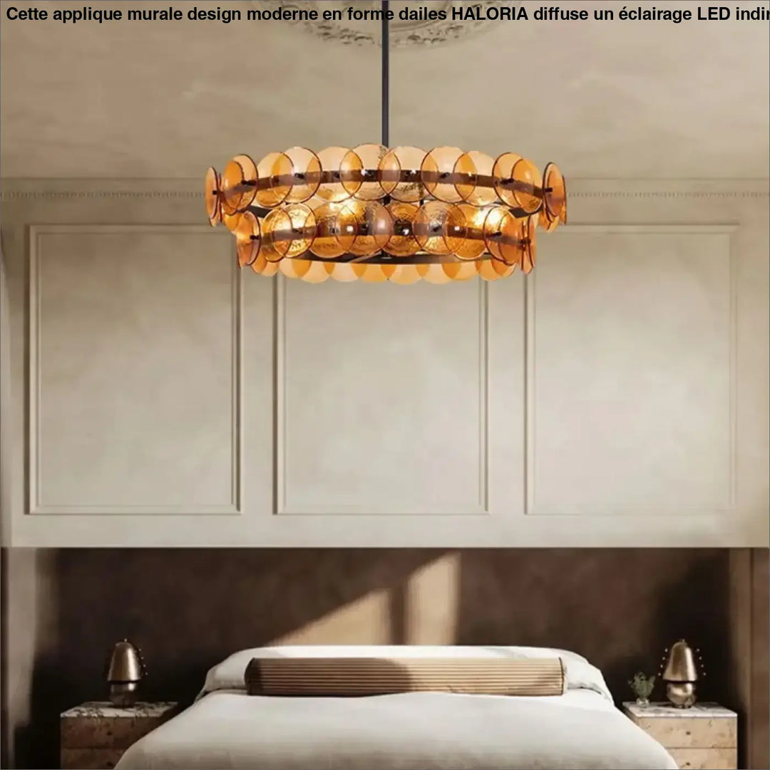 Applique murale design moderne en forme dailes avec suspension circulaire ambrée en verre et cadre métallique haloria