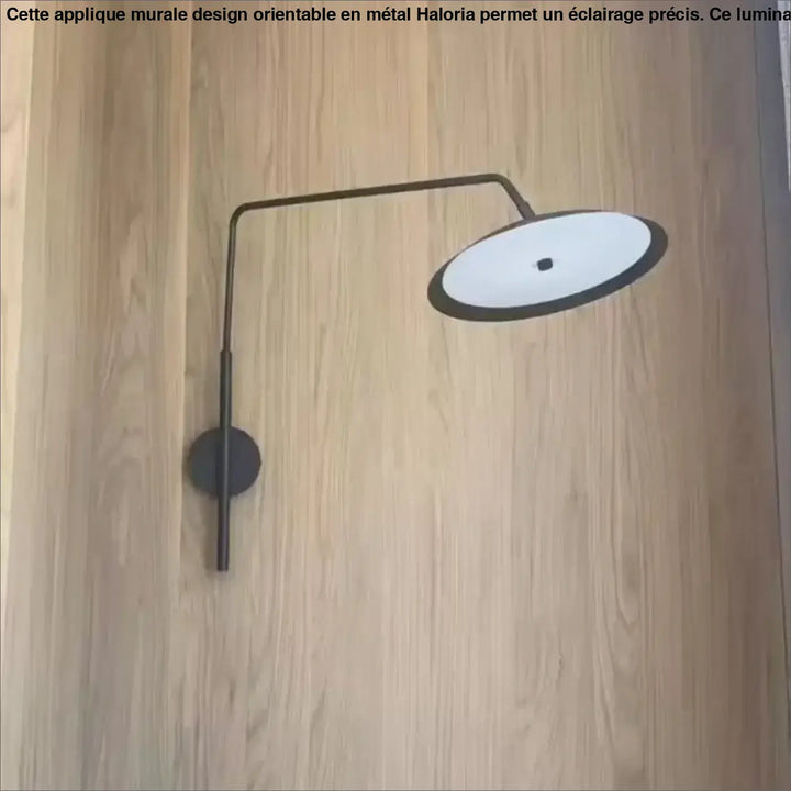Applique murale design orientable en metal noir moderne avec diffuseur ovale blanc minimaliste haloria