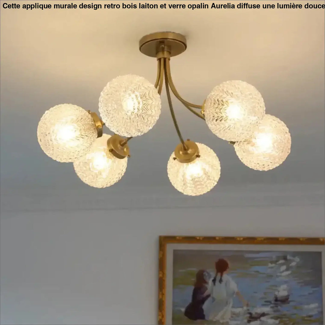 Suspension luminaire dorée avec globes en verre élégante