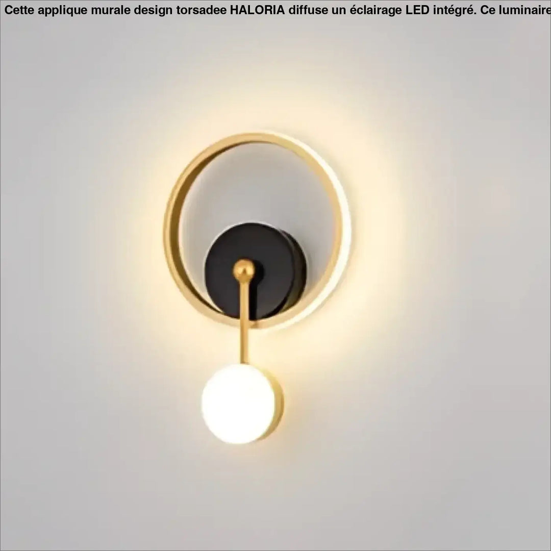 Applique murale haloria en métal doré avec disque noir central et ampoule sphérique blanche suspendue design murale