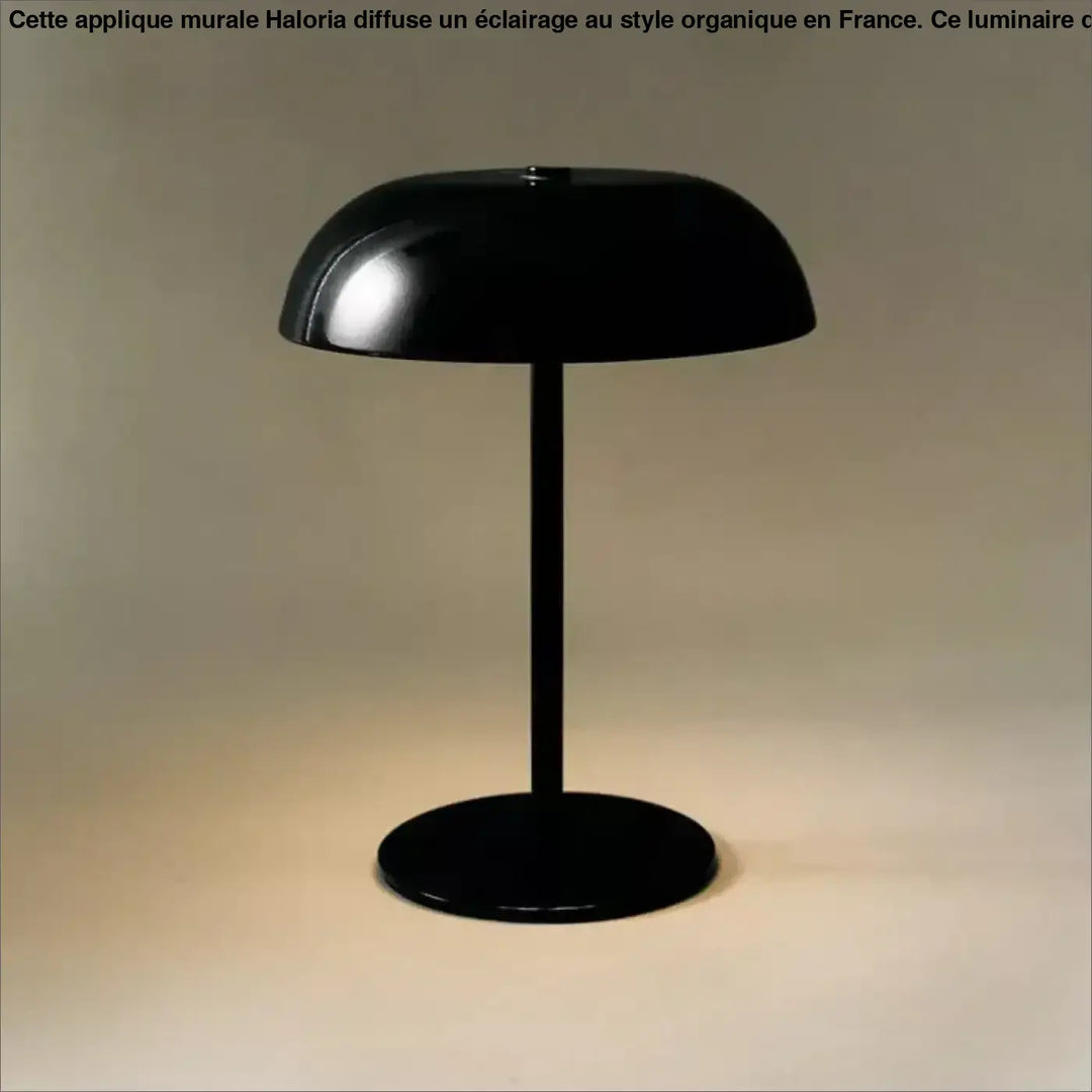 Lampe de table noire matte kapel avec silhouette minimaliste et détail participe pour un table moderne élégante