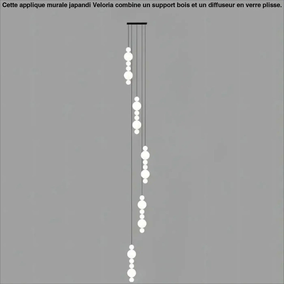 Suspension luminaire oxyo en forme de boule opaline blanche moderne avec cordons noirs minimalistes en chute verticale