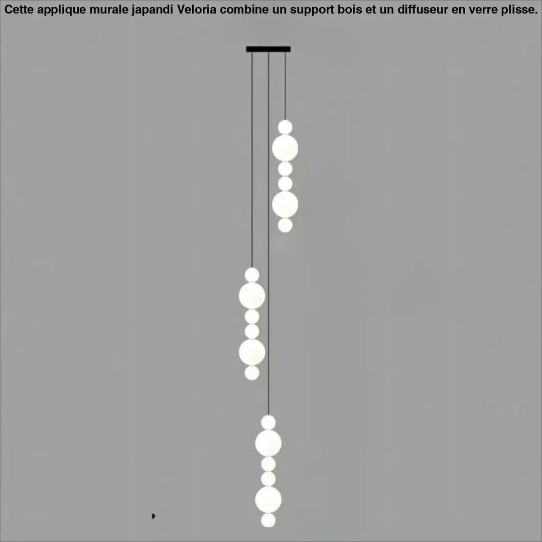Suspension luminaire oxyo avec boules opalines blanches sphériques et chute verticale noire elegante pour plafond