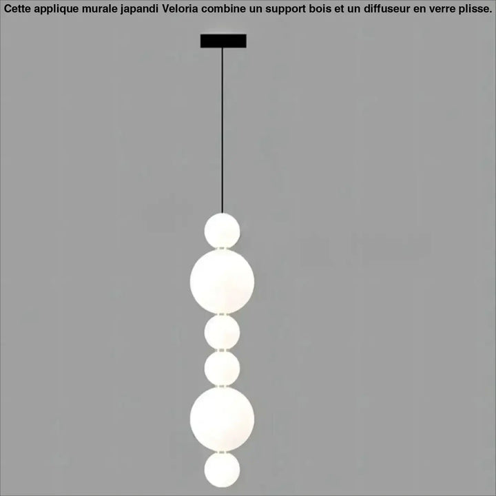 Suspension luminaire oxyo avec boules opalines blanches modernes et chute verticale noire élégante au plafond