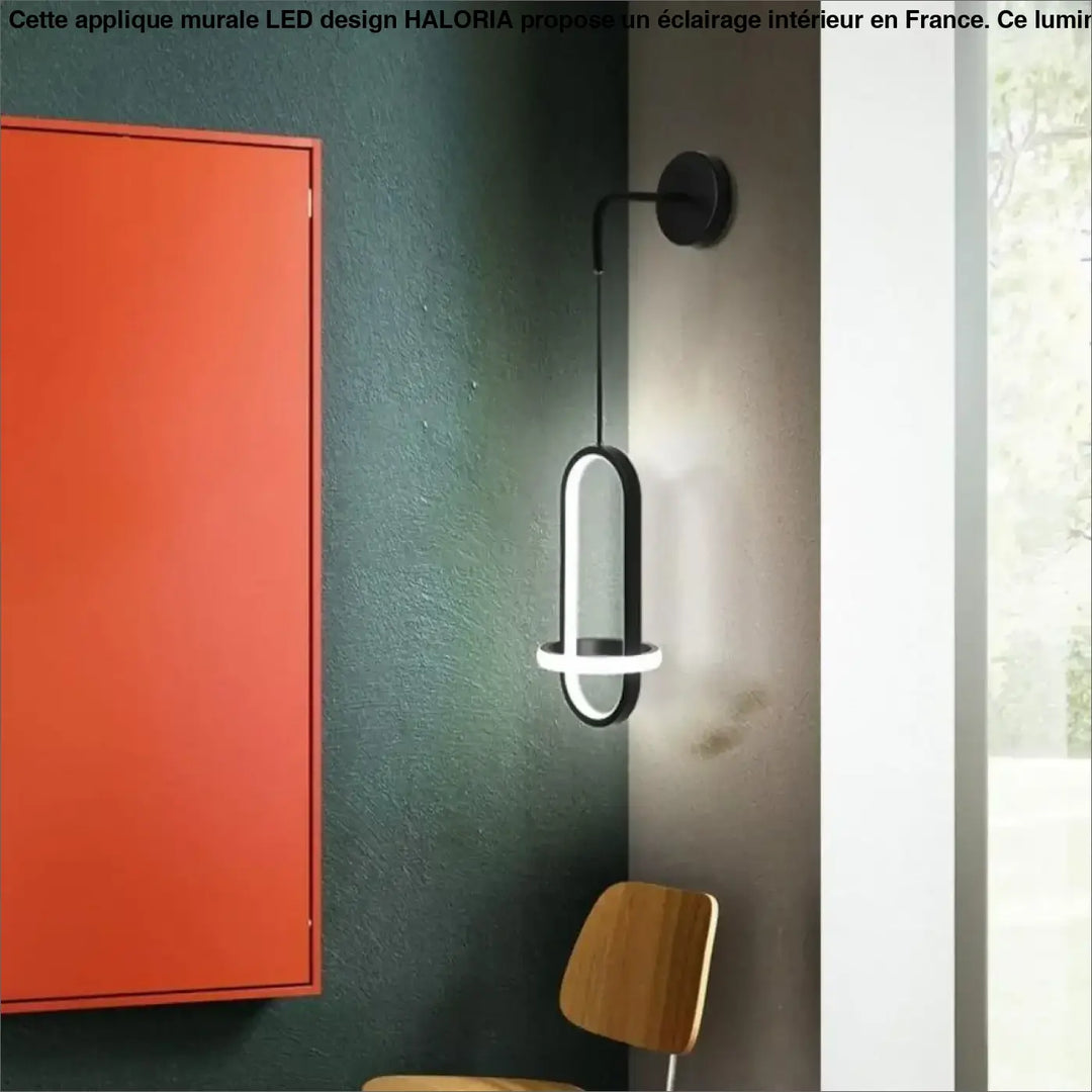 Applique murale led haloria noire moderne avec anneau ovale lumineux et bras courbé design minimaliste