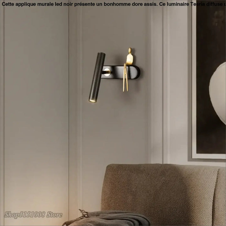 Applique murale LED noir avec un bonhomme doré assis


