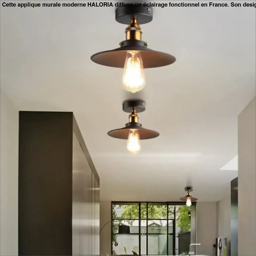 Luminaire plafonnier style industriel avec abat-jour noir mat, accents en laiton et ampoule edison apparente pour décoration intérieure