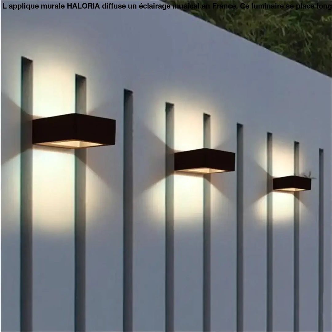Applique murale musque haloria noire carrée avec éclairage ambiant pour long d un couloir ou autour d un miroir