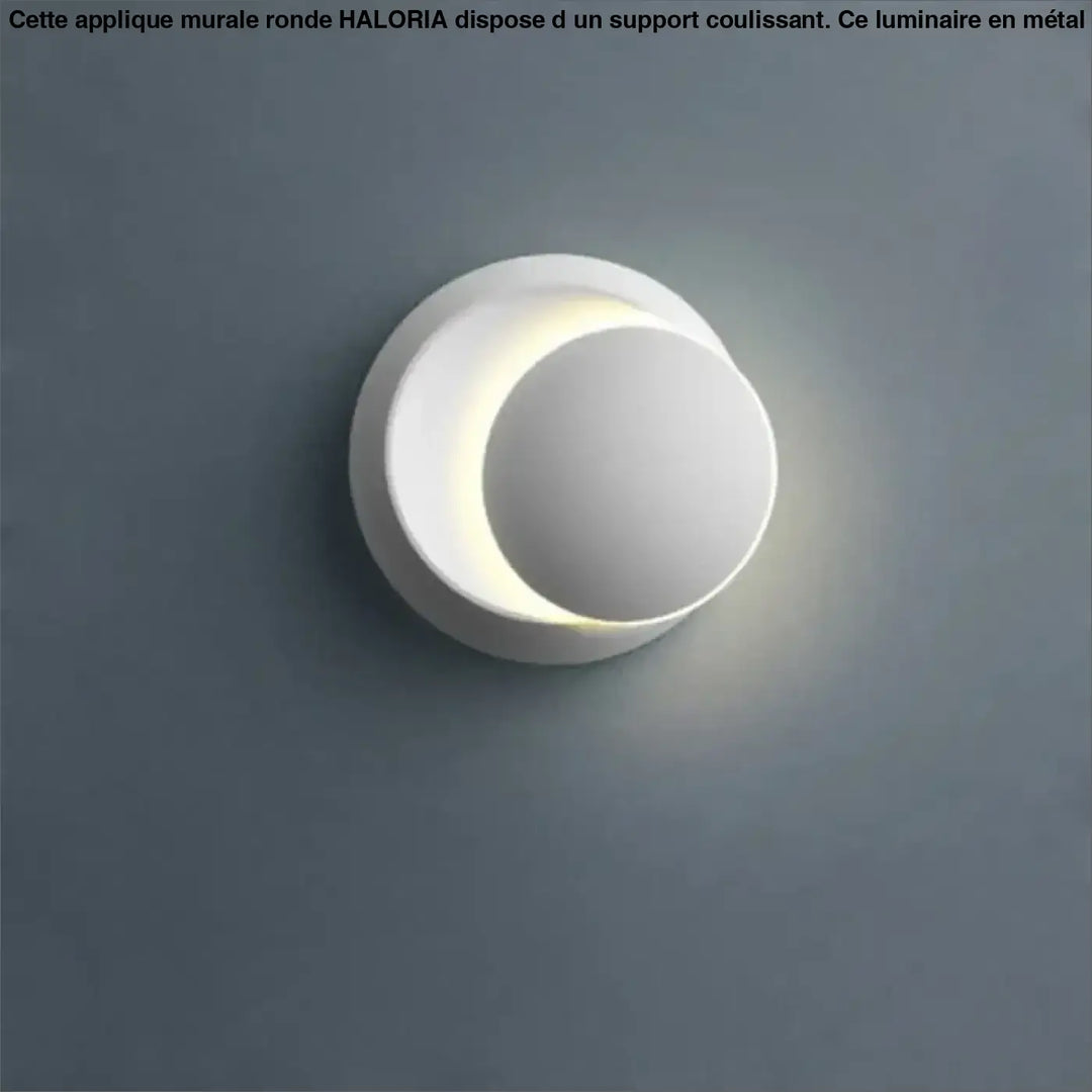 Applique murale ronde en céramique blanche avec design croissant et lumière ambiante douce haloria