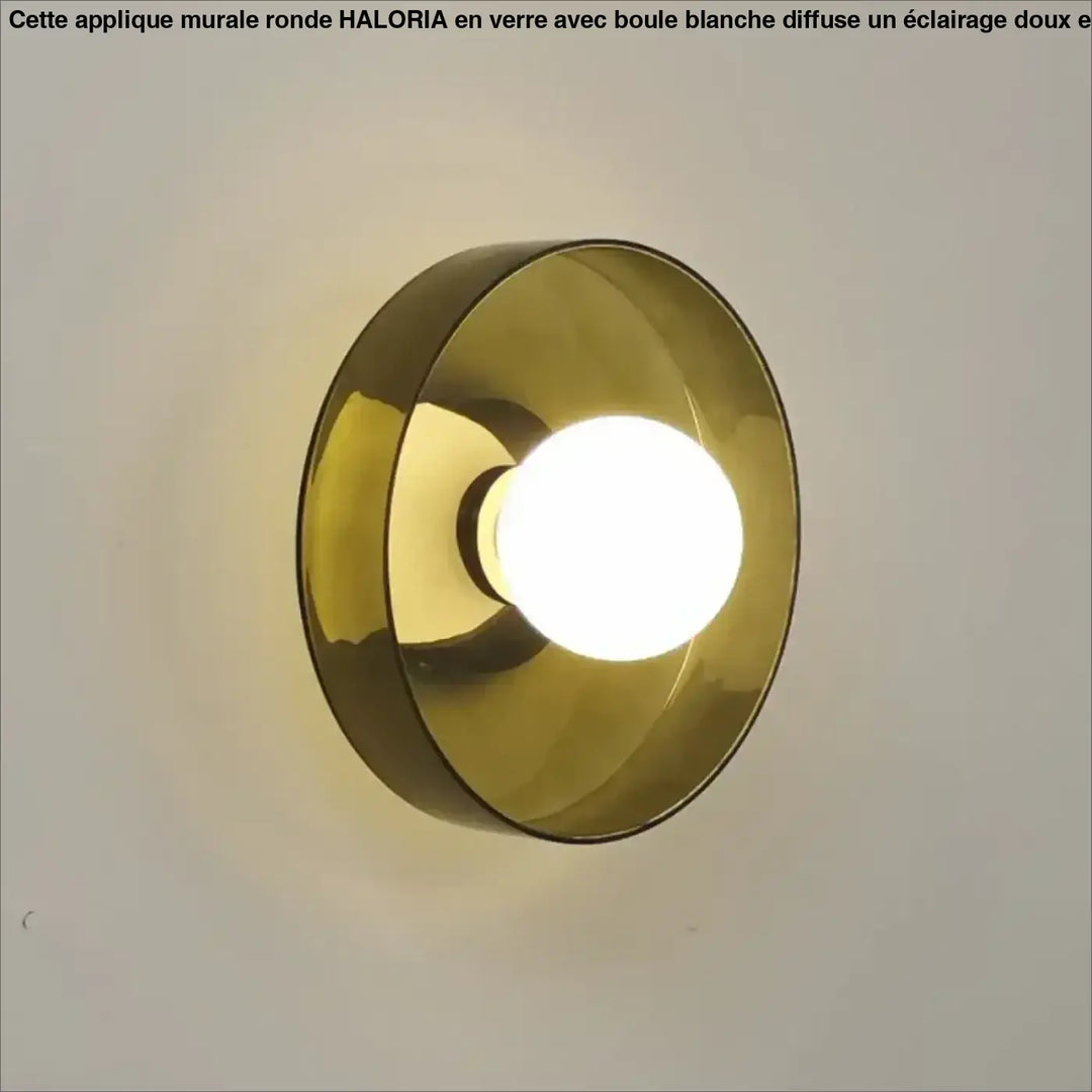 Applique murale ronde en verre avec une boule blanche

