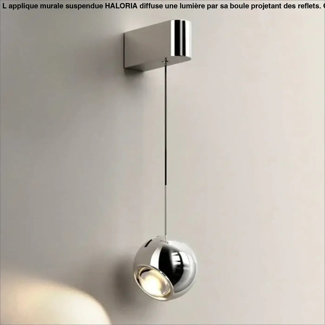 Applique murale suspendue avec une boule projetant la lumière

