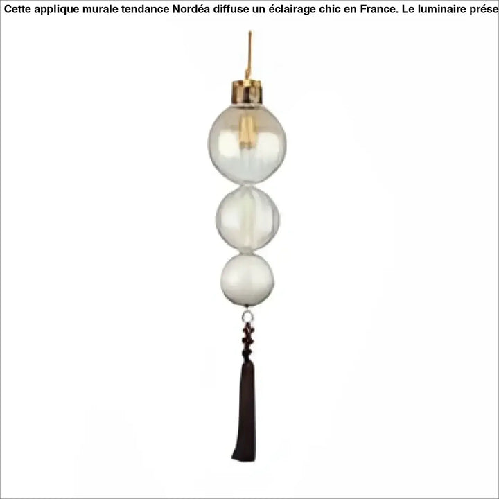 Suspension luminaire medina en verre clair avec accents métalliques dorés et pampille noire, plus qu’un luminaire verre teinté
