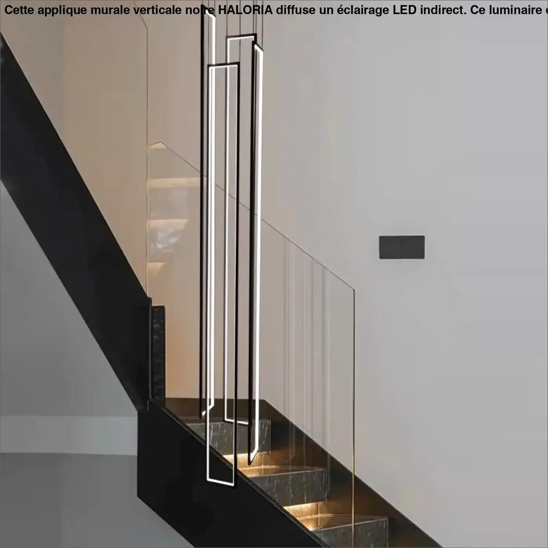 Suspension verticale noire avec cadres LED pour escalier