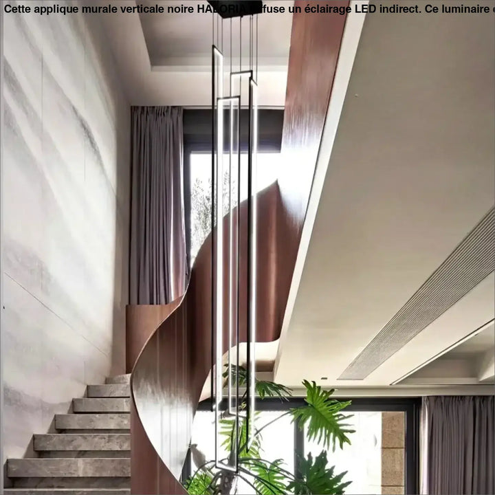 Suspension verticale noire avec cadres LED pour escalier