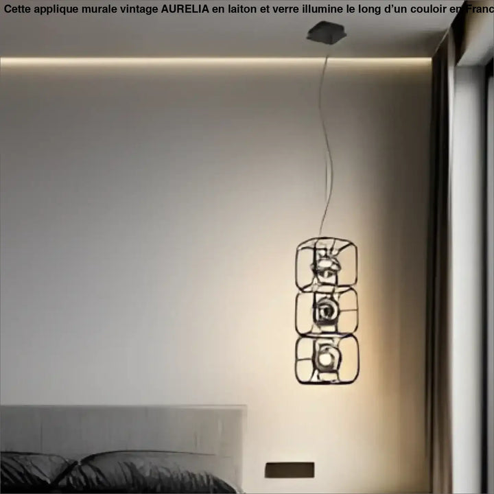 Suspension luminaire axoria noir en métal avec design géométrique aux formes graphiques cube lumineux à trois sections