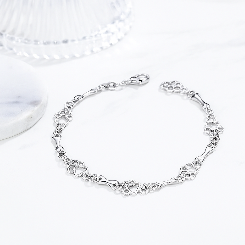 Armband mit Hundepfoten- und Knochenanhängern aus reinem Silber