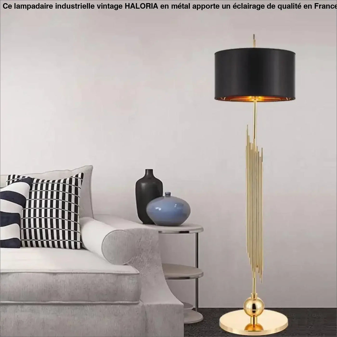 Lampadaire industrielle vintage haloria avec base en métal doré et abat-jour noir cylindrique intérieur doré chaleureux