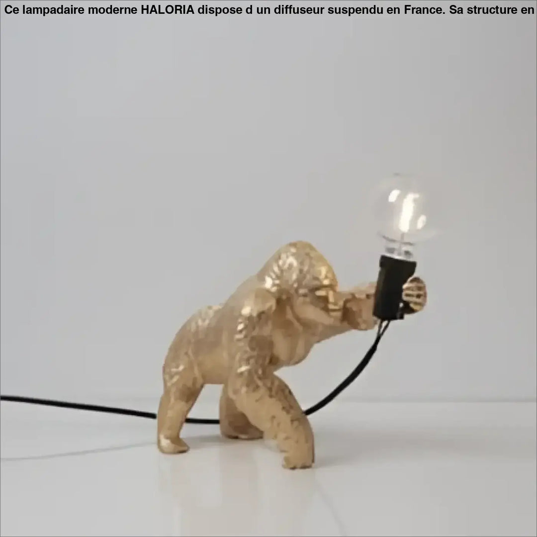 Lampe de table gorenzo ornée d un gorille artistique doré pailleté avec ampoule claire et cordon noir