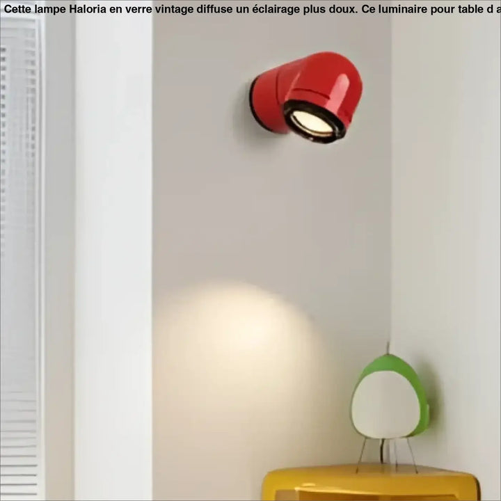 Applique murale spatiale spot cylindrique rouge avec bord noir et ampoule visible style rétro futuriste