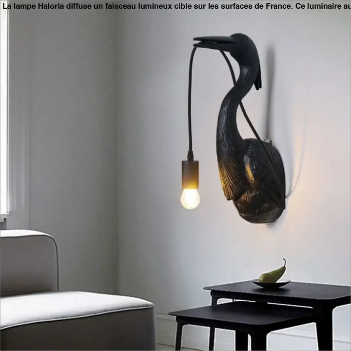 Applique murale en fer forgé noir en forme de pélican avec ampoule suspendue pour une touche artistique élégante