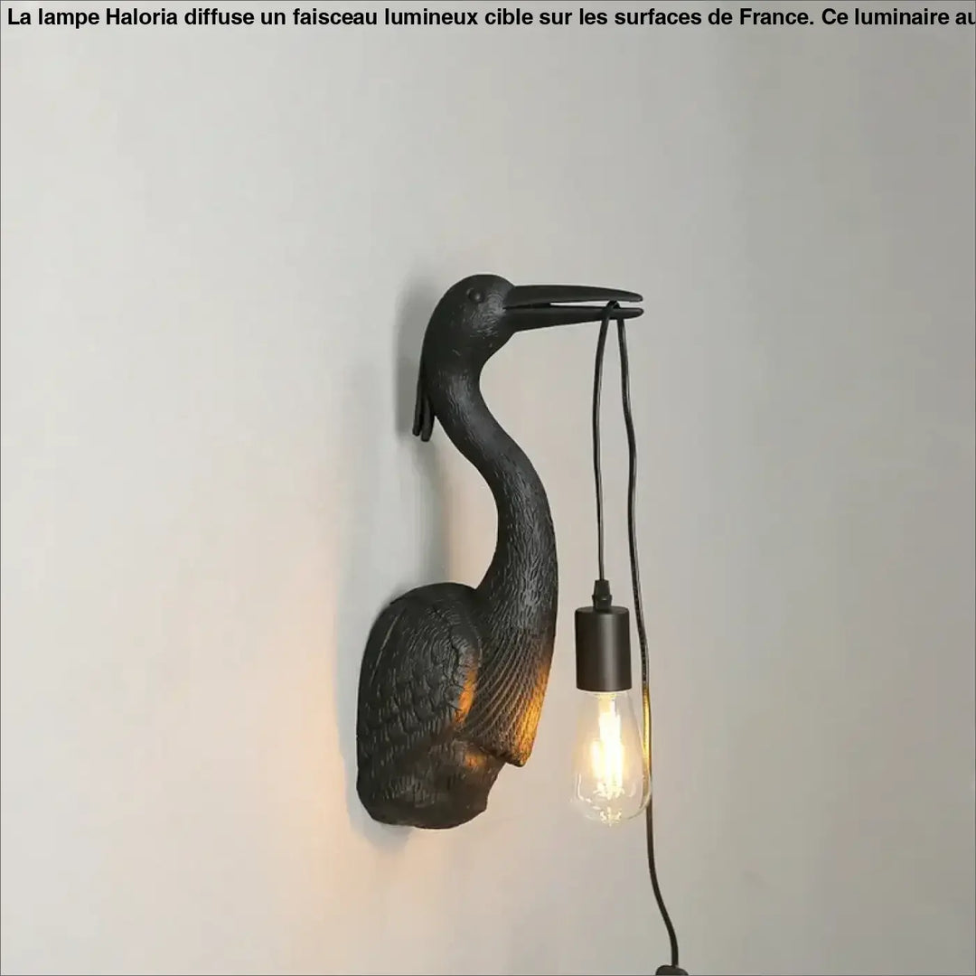 Applique murale en fer noir en forme de héron avec ampoule suspendue edison pour une touche artistique élégante