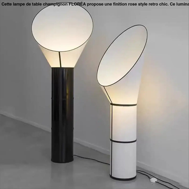 Lampadaire aloris avec base cylindrique moderne et lumière douce sous abat-jours blancs contours noirs design moderne