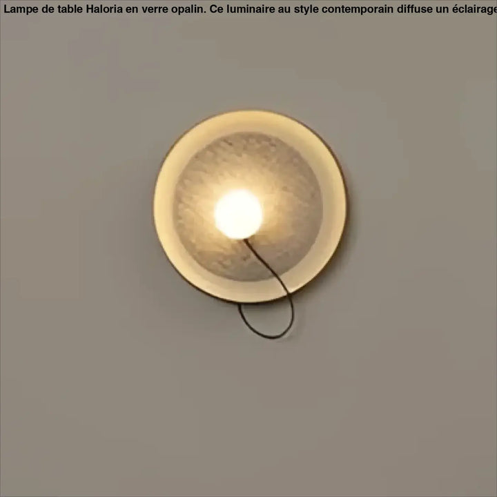 Applique murale contemporaine orluna circulaire avec lumière chaude et finition métallique texturée