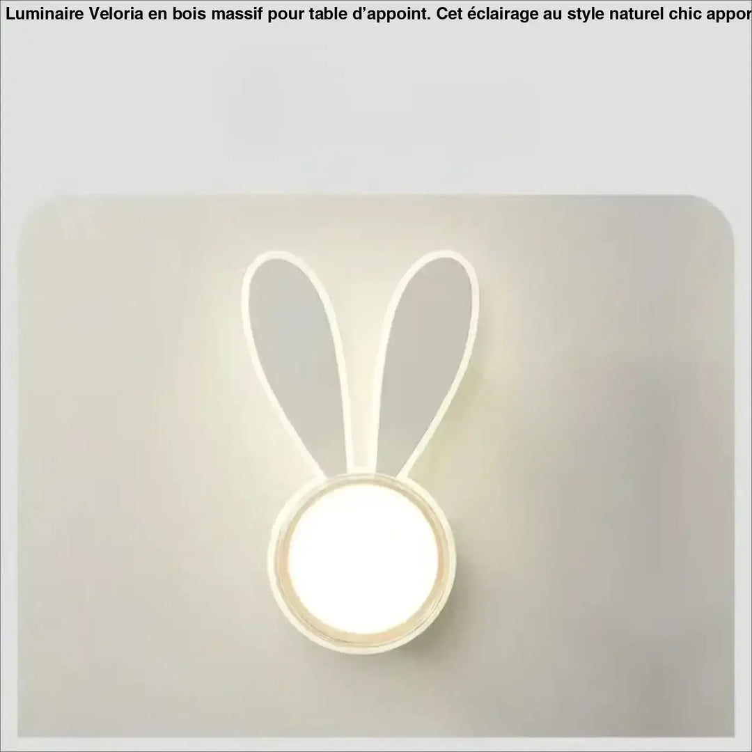 Applique murale moby en forme de lapin blanc avec lumière tamisée led ludique et design minimaliste