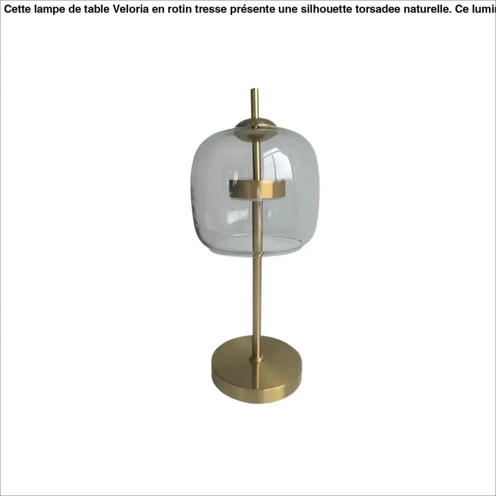 Lampe de table zelia avec verre transparent en forme de dôme et base en métal doré pour un design de table moderne