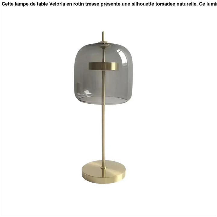 Lampe de table zelie avec dôme en verre transparent gris et structure en métal doré pour table design moderne