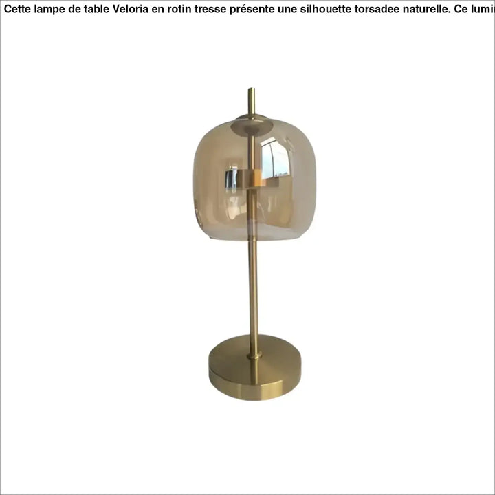 Lampe de table zelia avec métal doré et abat-jour en verre transparent ambré au design minimaliste élégant