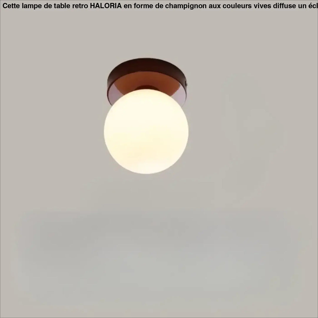 Applique murale puffo avec globe en verre chaud et base en métal bronze pour un abat-jours arrondis design doux