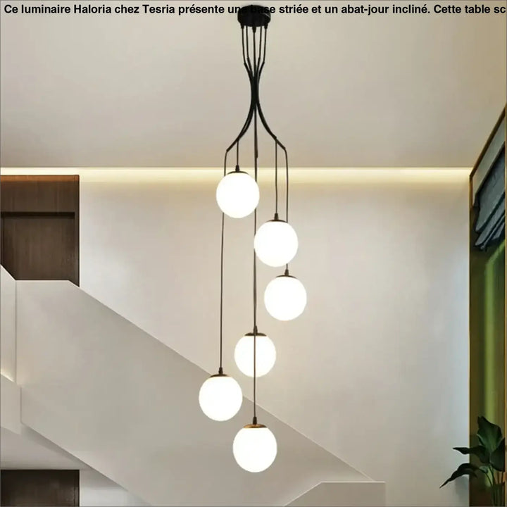 Suspension luminaire umami en métal noir moderne avec cinq globes en verre blanc sphériques lumineux