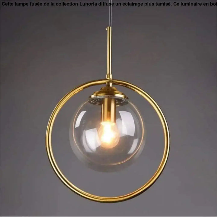 Lampe fusee lunoria avec globe en verre clair encadré or et ampoule filament pour éclairage plus ou table d’appoint