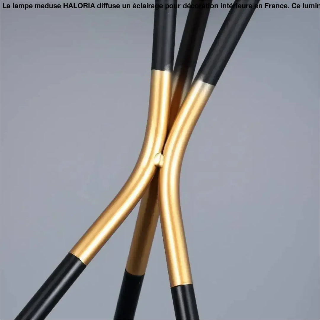 Lampe meduse coat rack in black and gold two tone metal with a sleek curved design for décoration plus and table d’appoint