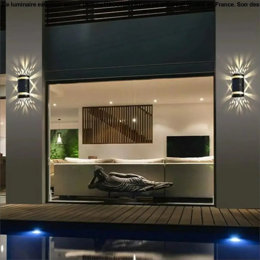 Luminaire exterieur autour piscine avec sculpture inclinée gris foncé de figure humaine musclée drapée en tissu