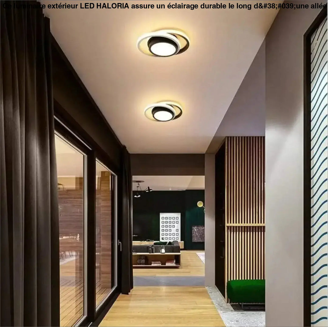 Luminaire extérieur led haloria avec design circulaire noir et blanc moderne pour éclairage long d’une allée