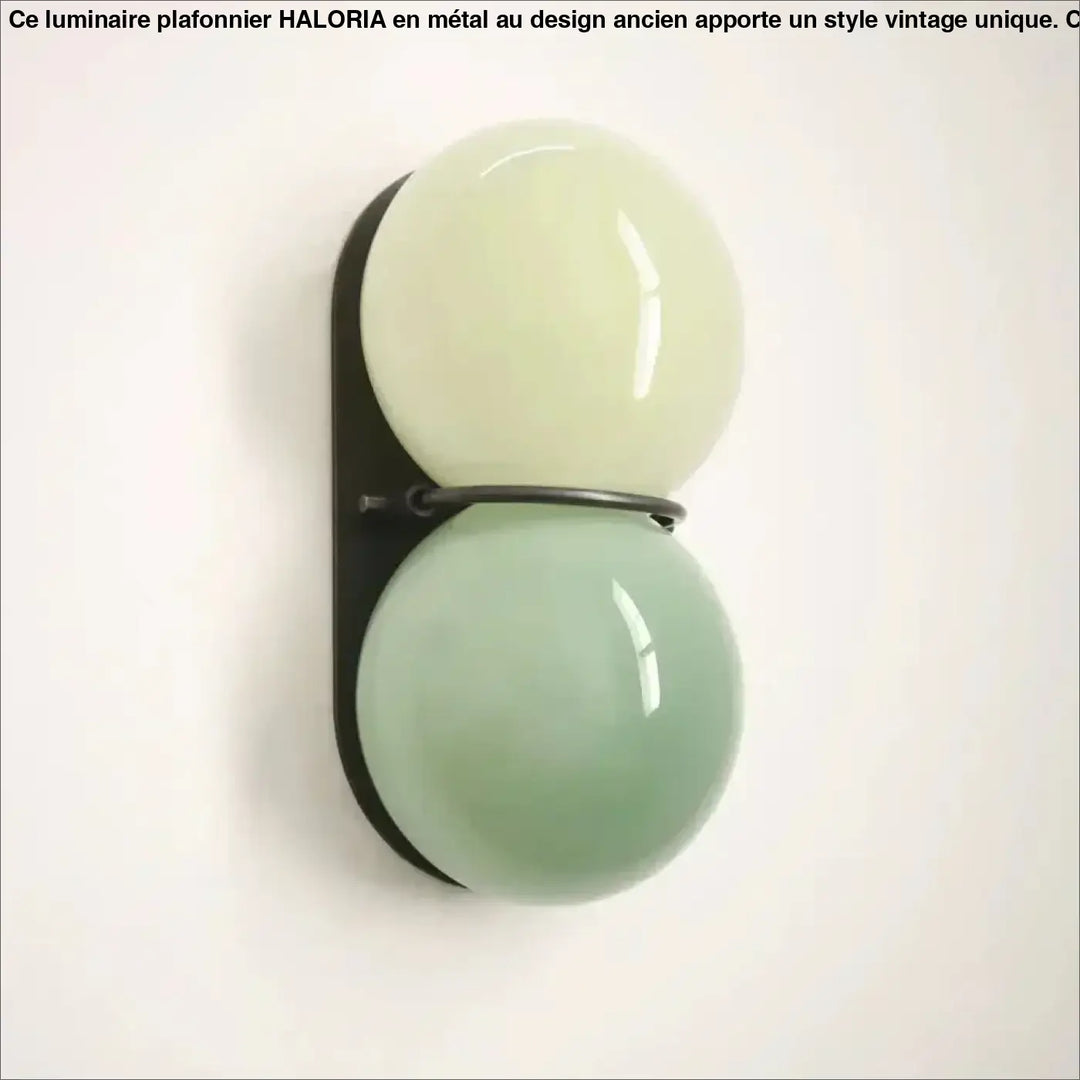 Applique murale gemini avec double boule en verre crème et vert menthe sur cadre métal noir pour décoration intérieure moderne