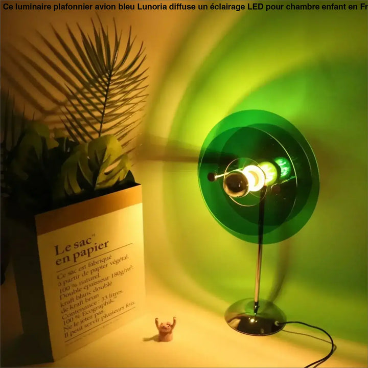 Lampe de table zyna en verre vert avec base et tige métalliques élégantes proposée dans le shop
